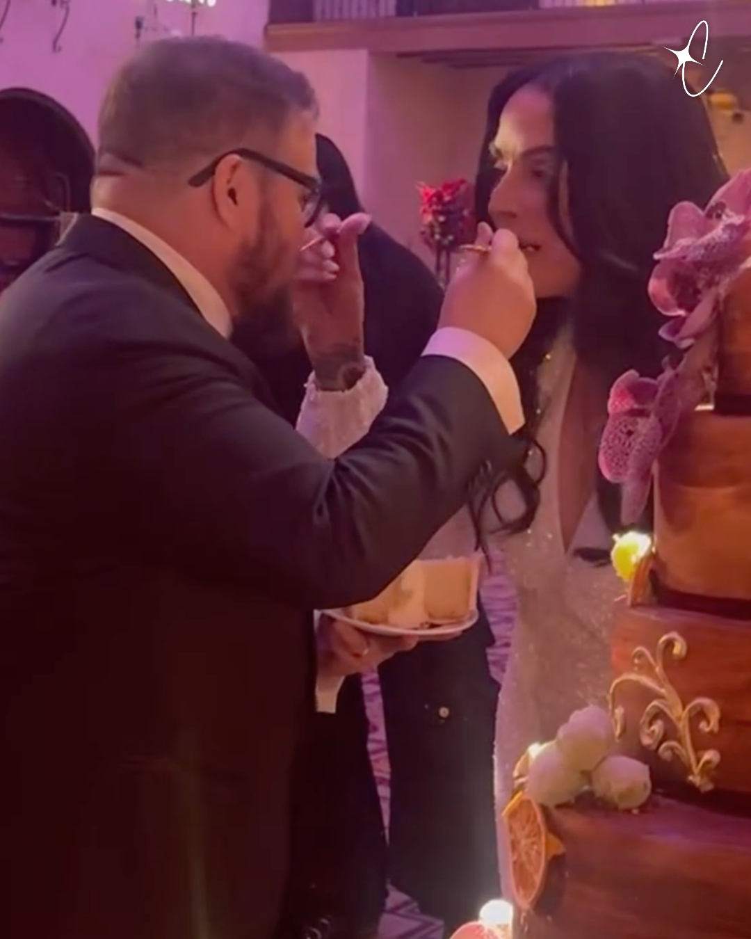 Shara Blue Bono and Chaz Bono eating their cake on their wedding day, from a post dated March 14, 2026 | Source: Instagram/sharablue