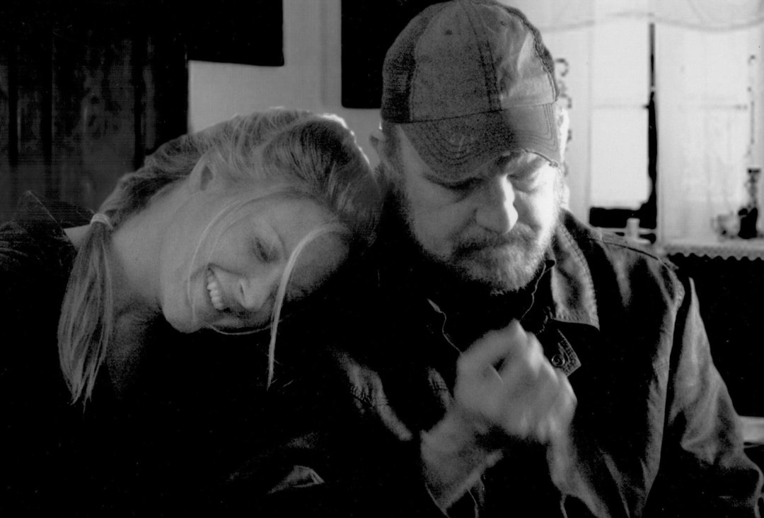 A black-and-white photo of Carrie Anne Fleming and Jim Beaver | Source: Facebook/jim.beaver.7731