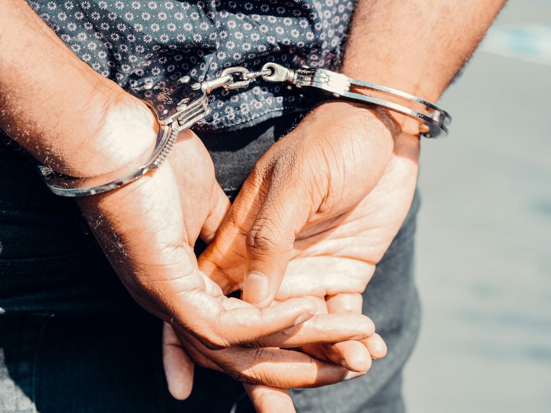 A person in handcuffs | Source: Pexels