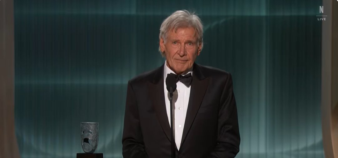 Harrison Ford begins his speech. | Source: YouTube/Netflix