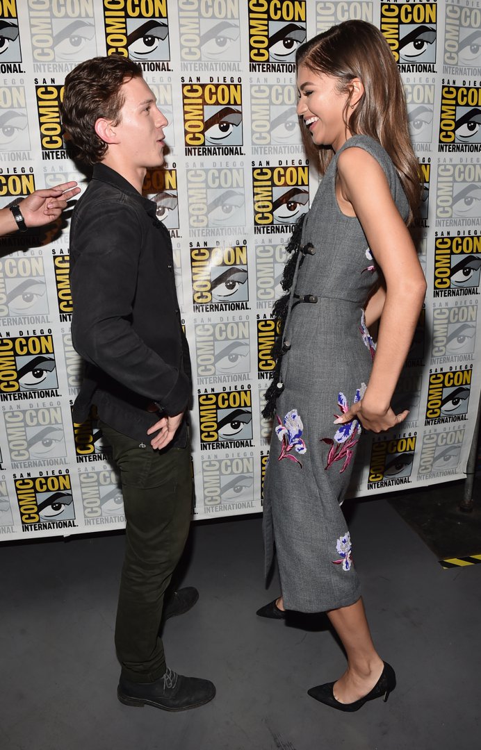 Snapped in their early days, long before the romance rumours took flight, Tom Holland and Zendaya shared a cheeky backstage moment at the Marvel Panel during San Diego Comic-Con on 23 July 2016. Grinning from ear to ear, the two looked effortlessly in sync — the early spark of what would become one of Hollywood’s most closely guarded love stories.
