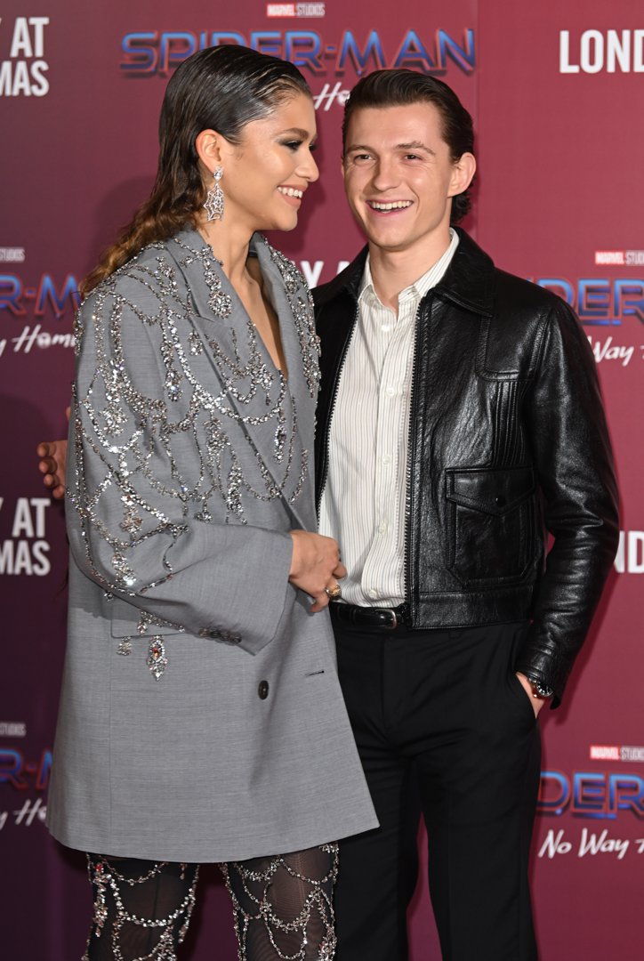 Making their red-carpet debut as a couple at a London photocall on 5 December 2021, Tom and Zendaya shared a giddy, golden-hour moment at The Old Sessions House. Zendaya glittered in a web-inspired look while Tom, sporting a slick leather jacket, beamed beside her. Leaning in close, the pair looked utterly at ease — a glowing reminder that their bond ran far deeper than Marvel magic.