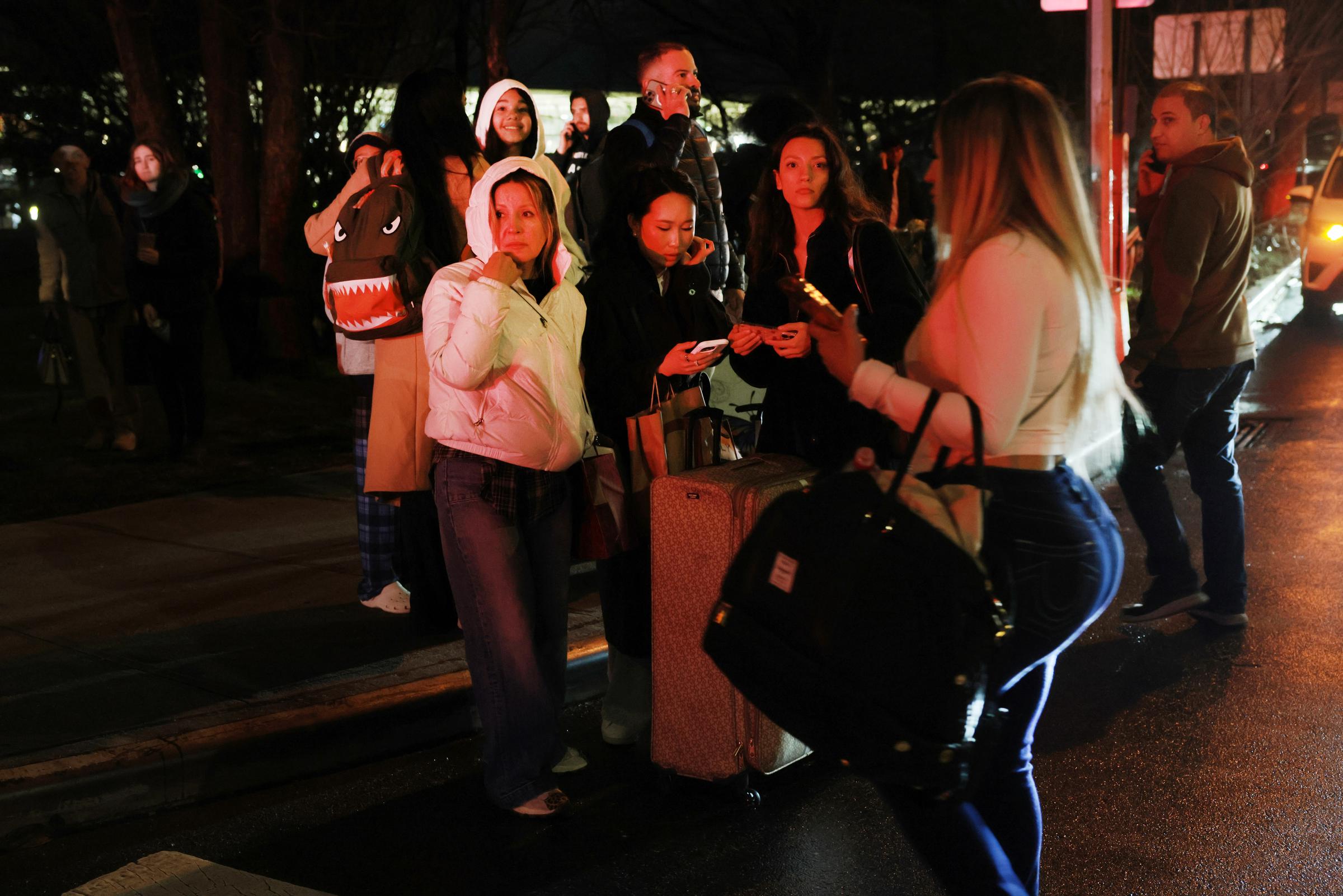 Travellers look for rides after LaGuardia Airport was closed following the collision | Source: Getty Images
