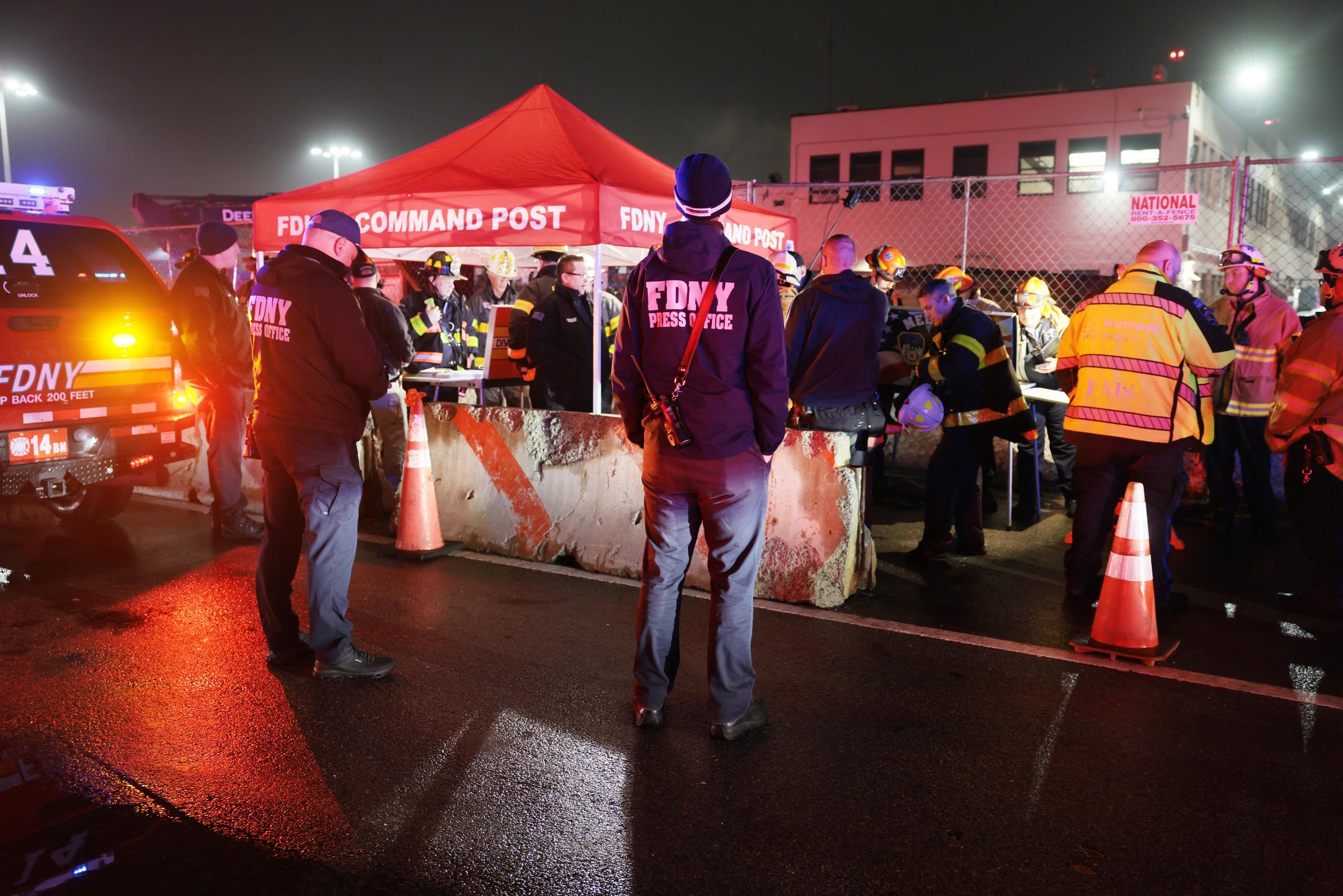 Emergency workers gather at the scene | Source: Getty Images
