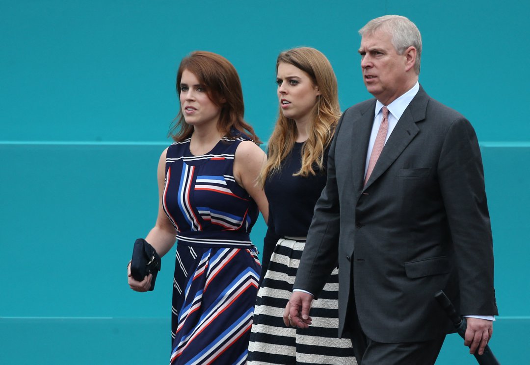 Princess Eugenie, Princess Beatrice, and Andrew Mountbatten-Windsor during the Patron's Lunch on 12 June 2016 in London, England. | Source: Getty Images
