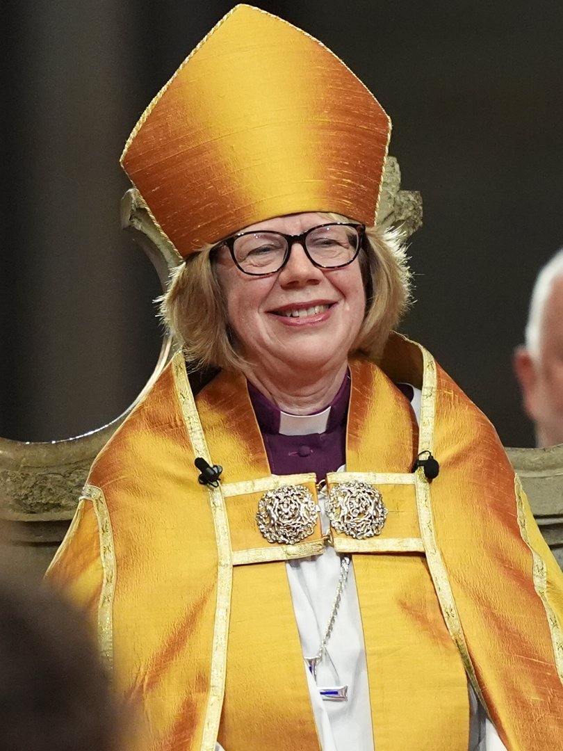 Seated in St Augustine's Chair at the moment her enthronement was complete, Mullally's expression said everything the ceremony had spent two hours building toward &mdash; the broad, unguarded smile of a former NHS nurse who had just become the spiritual leader of 85 million Anglicans worldwide.