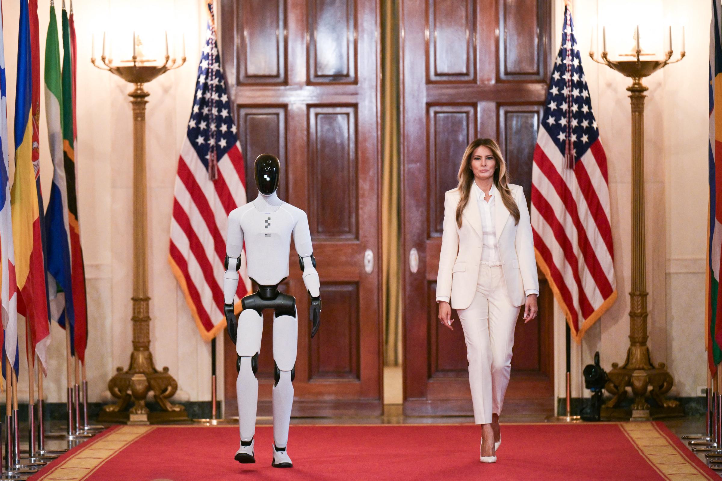 Melania Trump and the humanoid robot are seen at the 