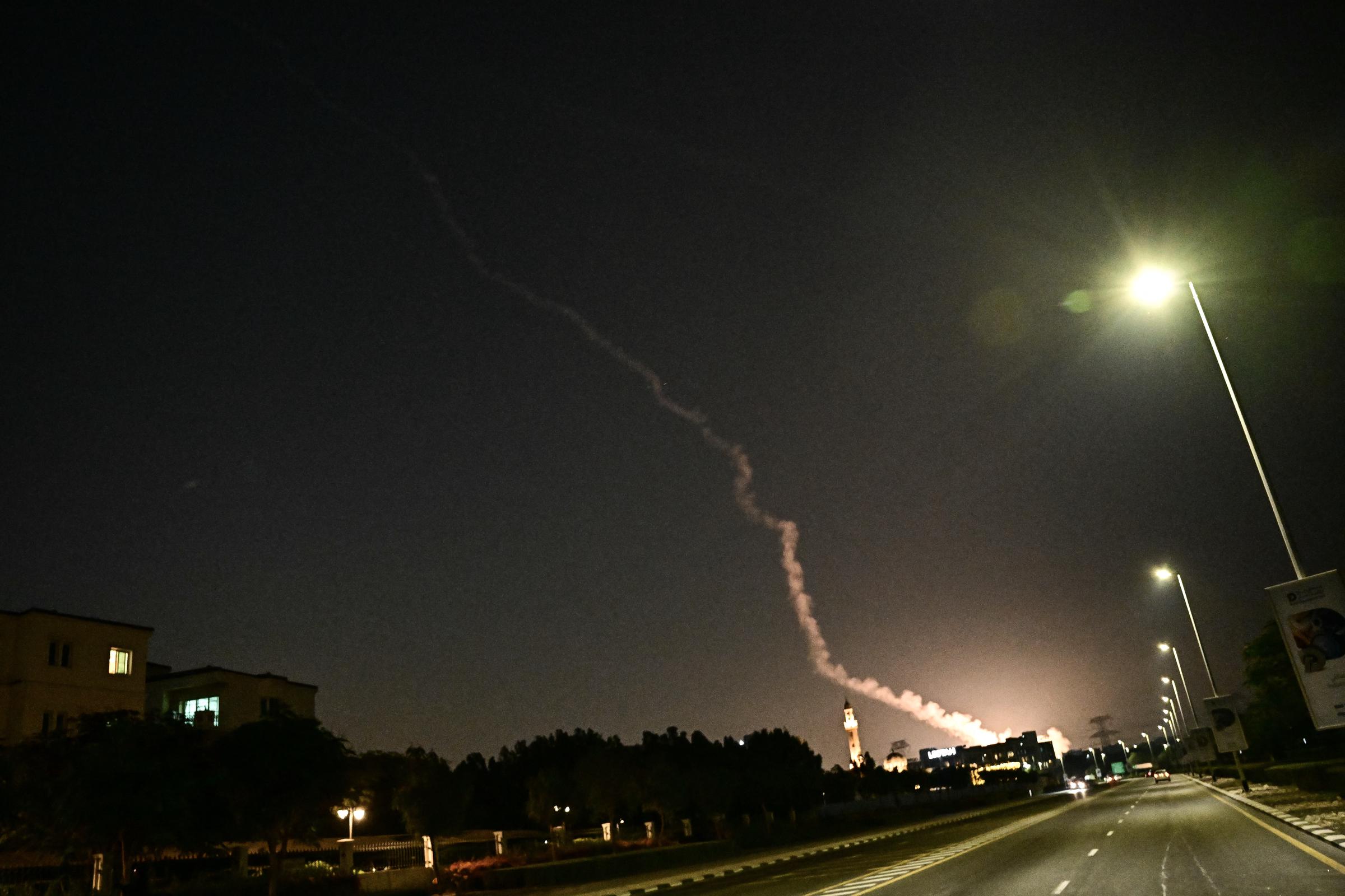 Smoke from a reported rocket interception is seen in the sky over in Dubai on 28 February 2026. | Source: Getty Images