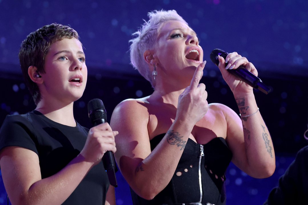 During the Democratic National Convention on August 22, 2024, in Illinois, United States, Willow Sage Hart stood shoulder to shoulder with her mother under the bright stage lights, delivering a powerful performance. Holding her microphone with steady focus and a maturity beyond her years, she matched the moment's intensity note for note.