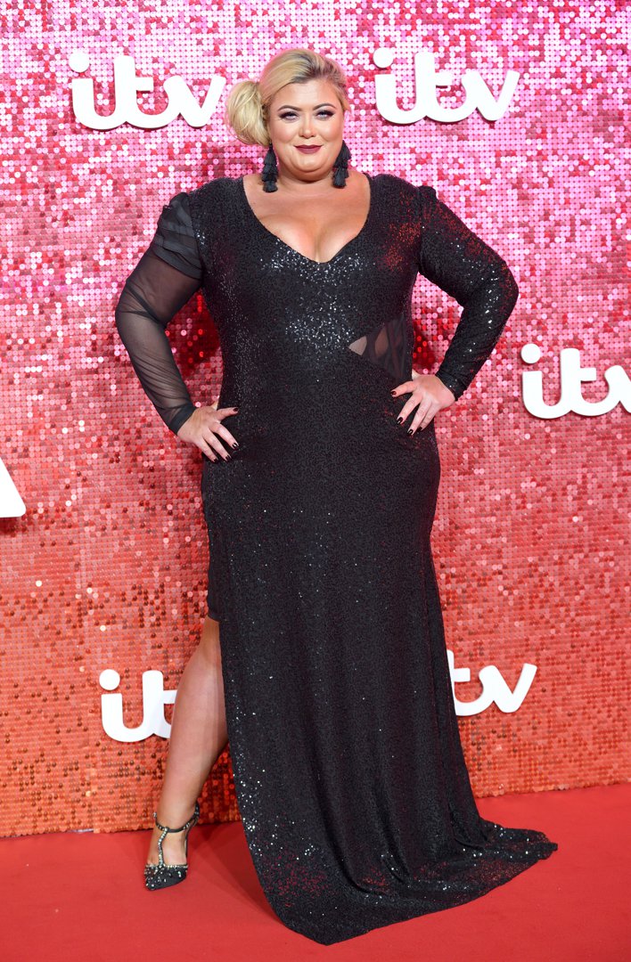 Collins is every inch the diva at the ITV Gala red carpet on 9 November 2017, commanding attention in a figure-hugging black sequinned gown with sheer panels and bold tassel earrings &mdash; all eyes firmly on her.