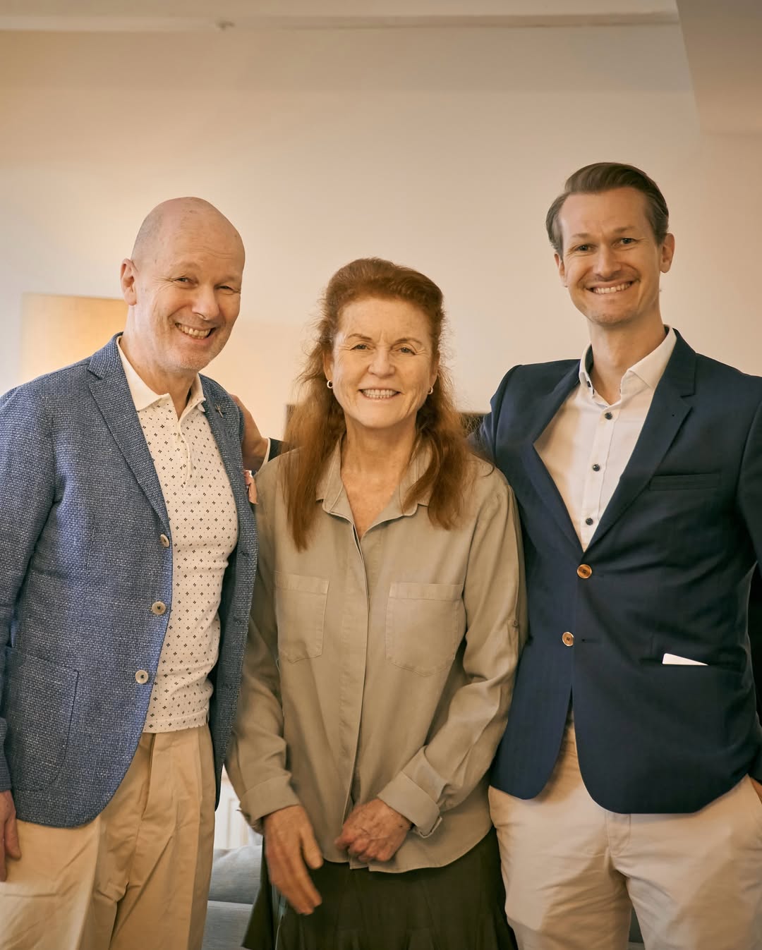 Sarah Ferguson (C) poses for a photo, posted 16 January 2025, with Jan Gerber (R) and another gentleman. | Source: Instagram/sarahferguson15