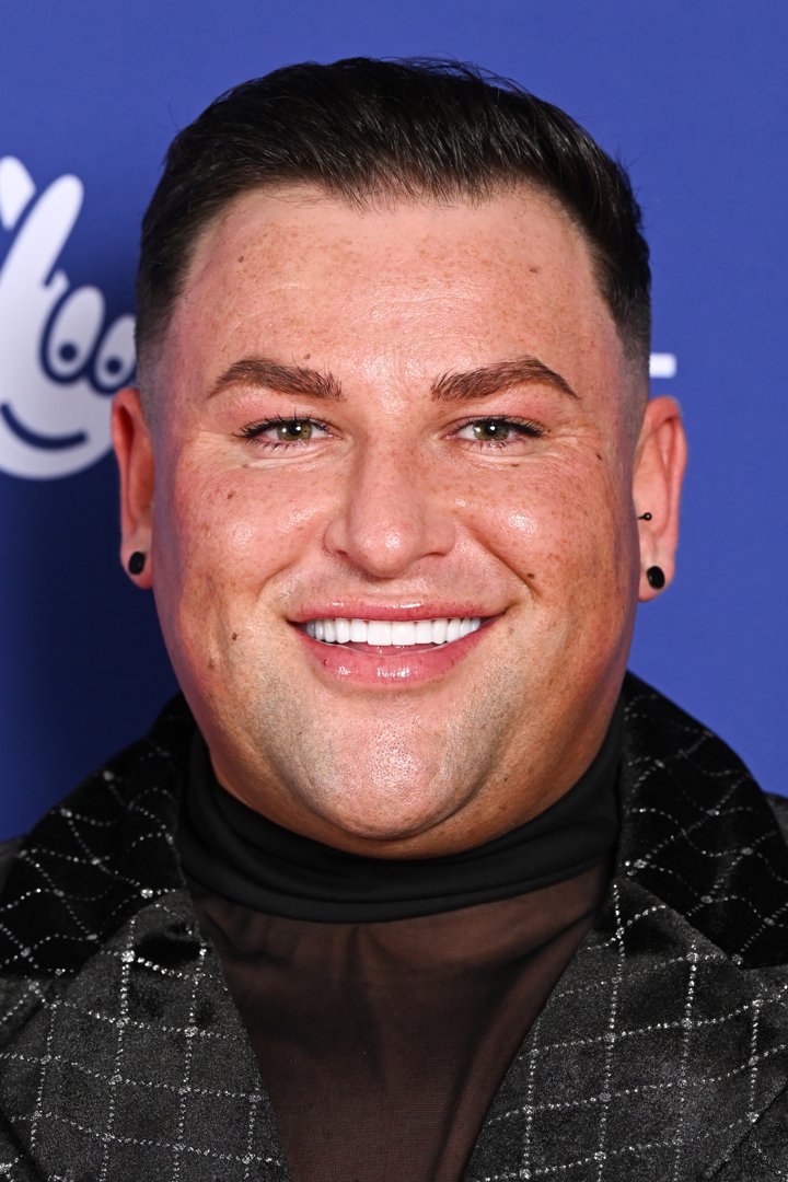 Beaming with confidence, Potts brings his signature polish to The National Lottery New Year's Eve Big Bash 2024 at the OVO Arena Wembley on 4 December. Wearing a sparkling sheer-detailed black ensemble, the TV star nails glam with edge, posing with that signature gleam and crisp, styled hair.