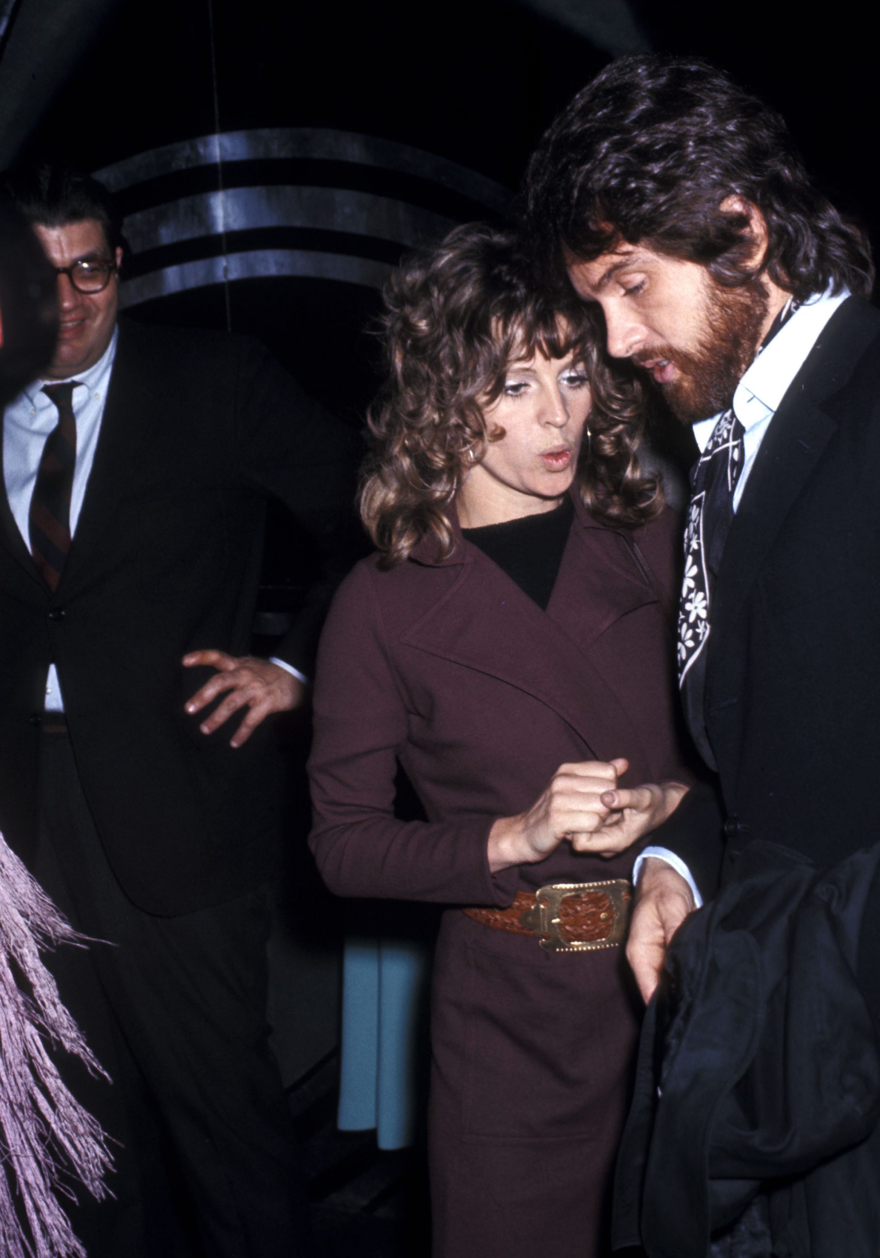Christie arrives at the American Film Institute Benefit alongside actor Warren Beatty on 27 May 1970 at Westbeth Artists Housing in New York City. Dressed in a sleek brown ensemble cinched with a statement belt, Christie appears mid-conversation with Beatty, the pair sharing an animated moment that captures the glamour, intrigue and creative energy of Hollywood's most talked-about couples of the era.