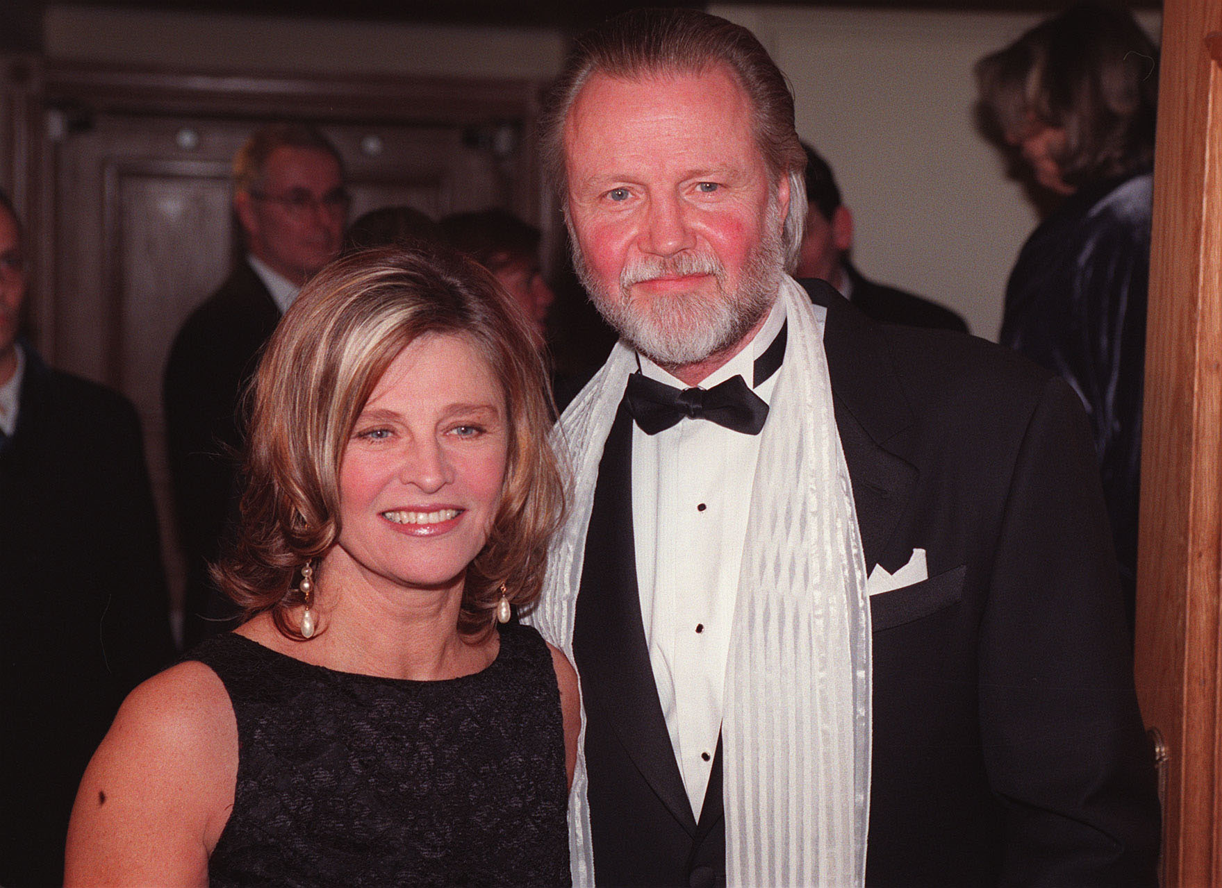 Christie poses with actor Jon Voight at the Evening Standard British Film Awards in 1998, held at London's Savoy Hotel. Dressed elegantly for the occasion, Christie stands alongside the 