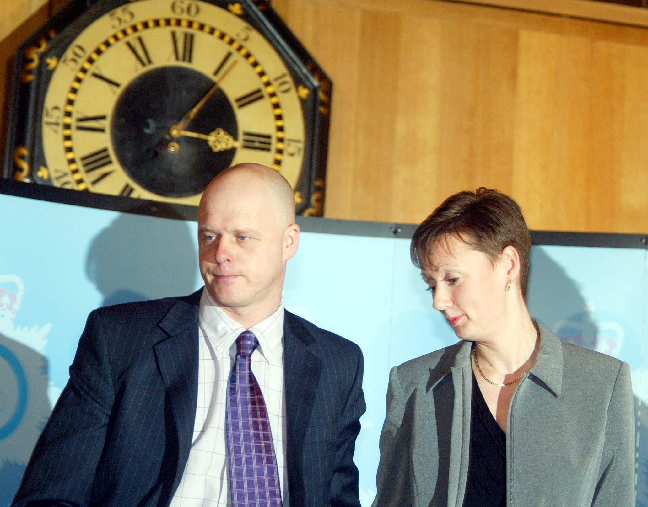 Kevin and Nicola Wells, the parents of the murdered schoolgirl Holly Wells, pictured during a press conference following the end of the trial in which Ian Huntley was convicted of two murders inside the Old Bailey Criminal Court on December 17, 2003, in London, England. | Source: Getty Images