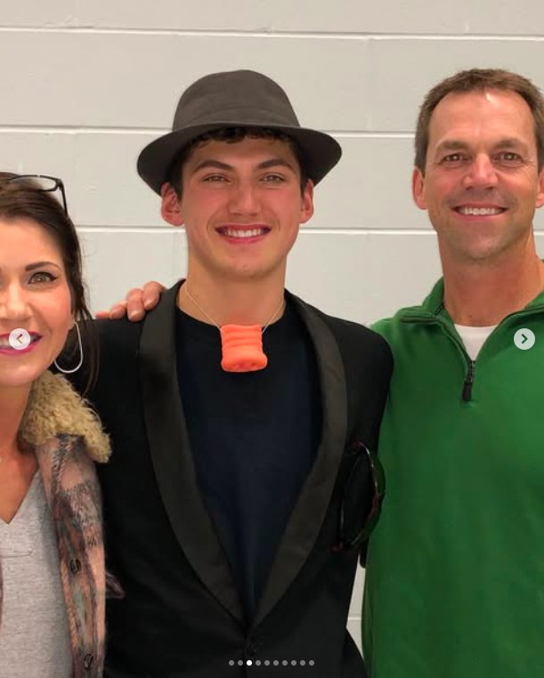 Kristi and Bryon Noem with their son, Booker Noem, posted on May 21, 2022. | Source: Instagram/sdbryonnoem