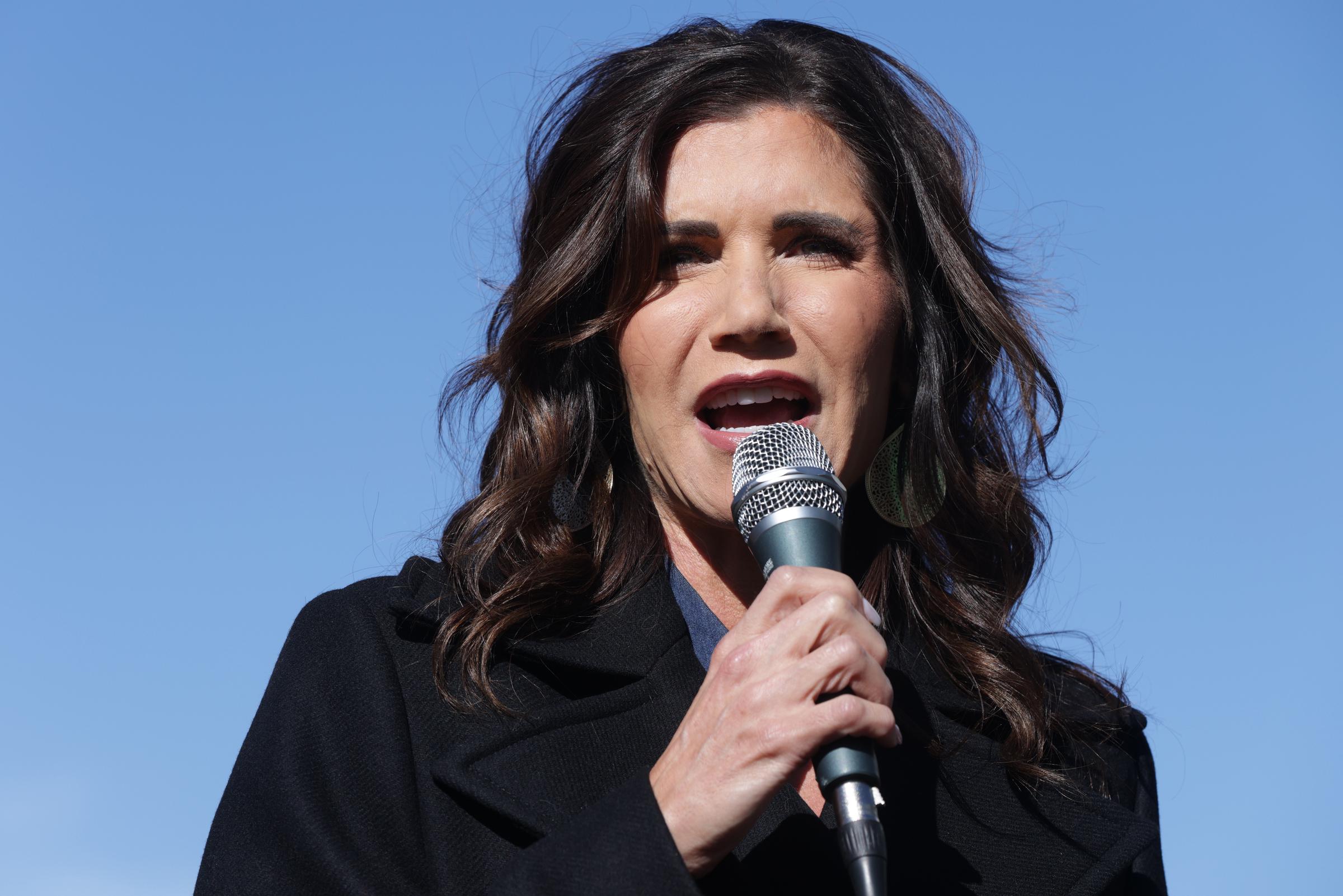 Kristi Noem speaks while campaigning for U.S. Sen. Kelly Loeffler during a campaign event outside Gritz Family Restaurant on January 3, 2021, in McDonough, Georgia | Source: Getty Images