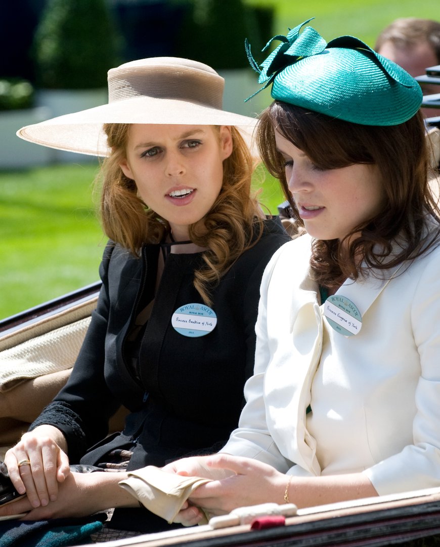 Princess Beatrice and Princess Eugenie in a horse-drawn carriage for the opening day of the Royal Ascot at Ascot Racecourse on June 14, 2011, in England. | Source: Getty Images