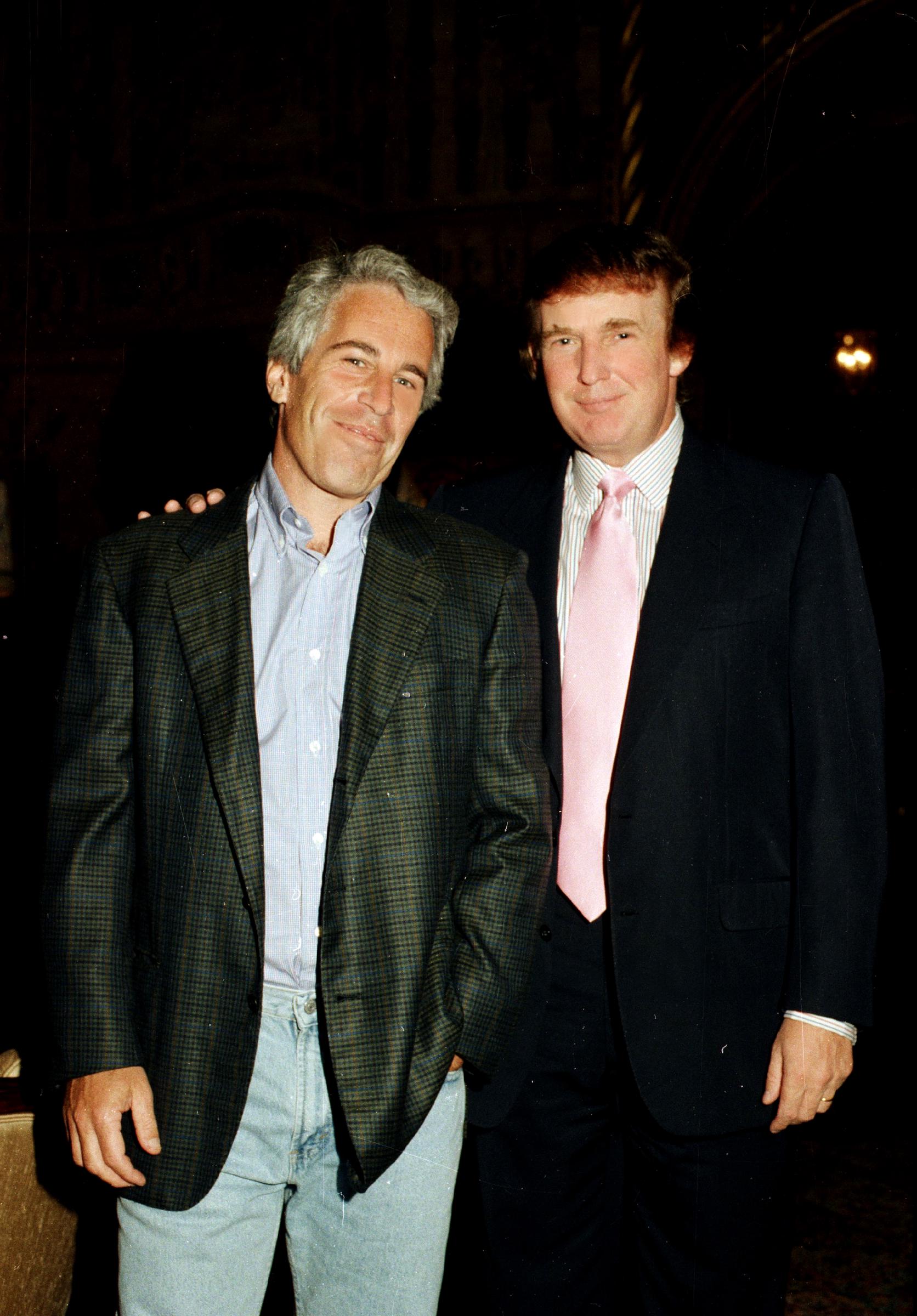 Jeffrey Epstein and Donald Trump pose together at the Mar-a-Lago estate on 22 February 1997 in Palm Beach, Florida. | Source: Gettty Images