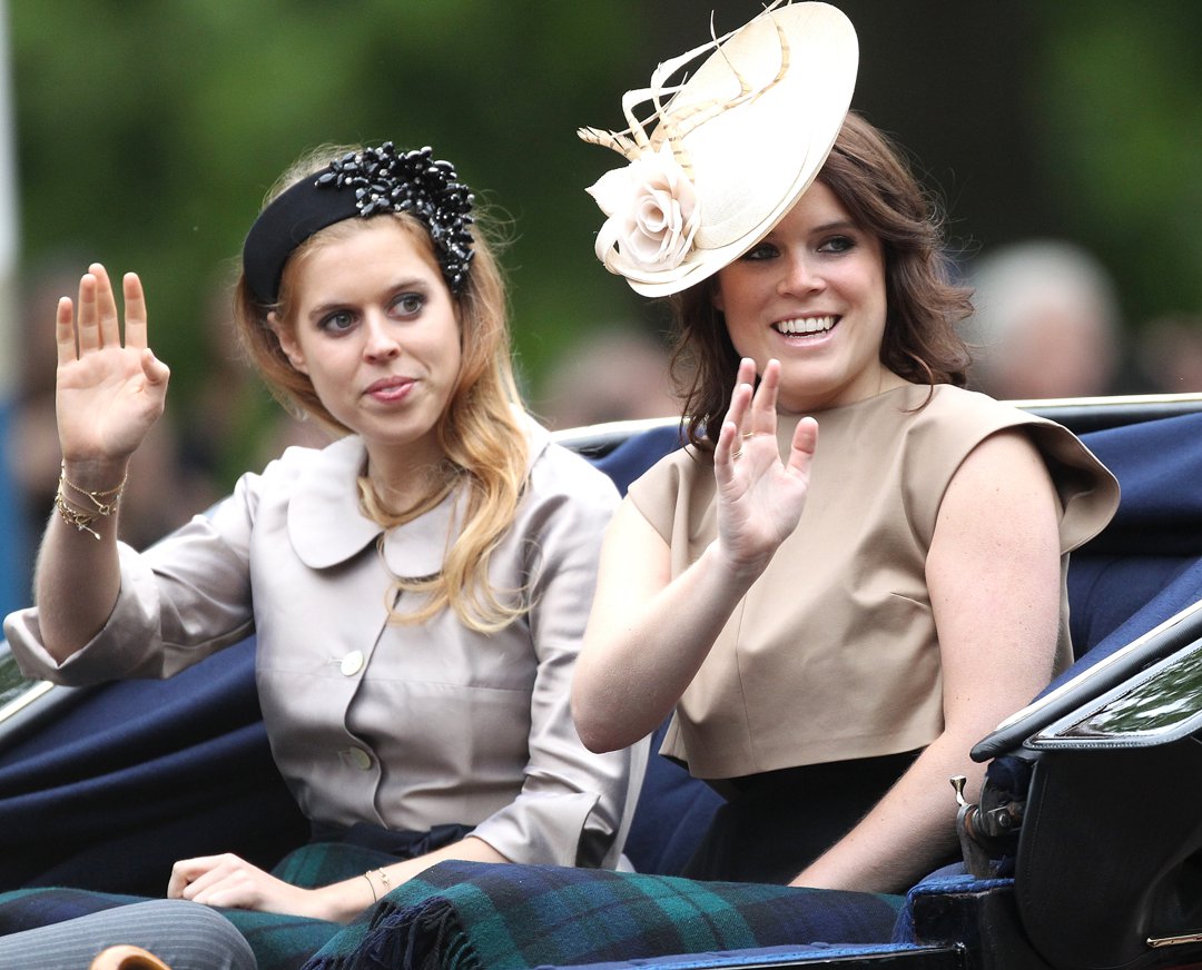 Princess Beatrice of York and Princess Eugenie of York wave at the crowd during the annual Trooping The Colour ceremony at Horse Guards Parade on 13 June 2015 in London, England. | Source: Getty Images