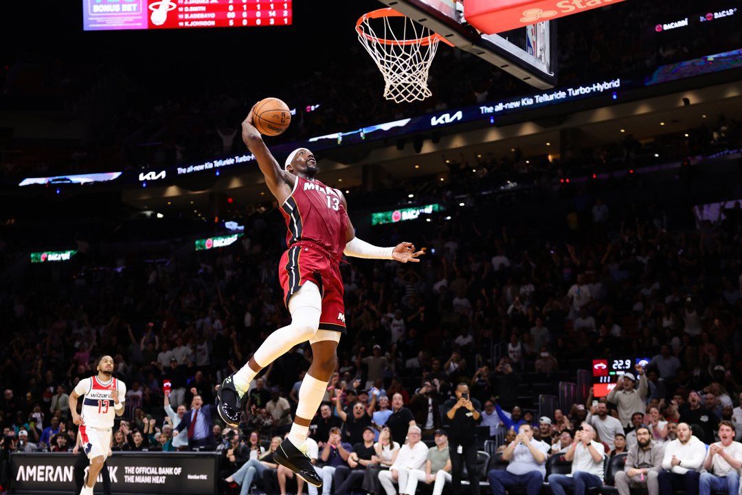 Bam Adebayo dunks the ball against the Washington Wizards at Kaseya Center on March 10, 2026, in Miami, Florida | Source: Getty Images