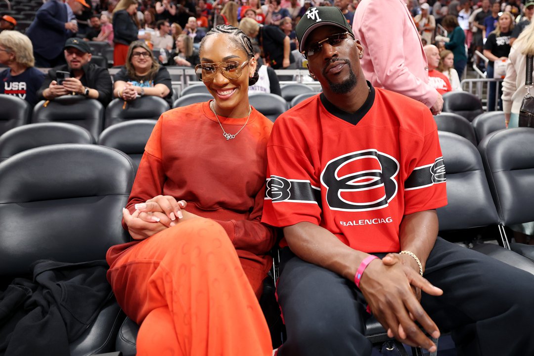 A'ja Wilson and Bam Adebayo talk prior to the STARRY 3-Point Contest during the AT&T WNBA All-Star weekend at Gainbridge Fieldhouse on July 18, 2025, in Indianapolis, Indiana | Source: Getty Images