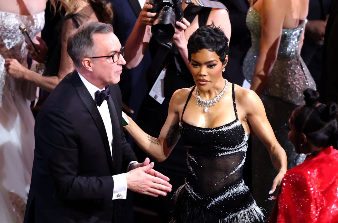 Academy of Motion Picture Arts and Sciences CEO Bill Kramer and Teyana Taylor at the 98th Academy Awards in Hollywood on March 15, 2026 | Source: Getty Images