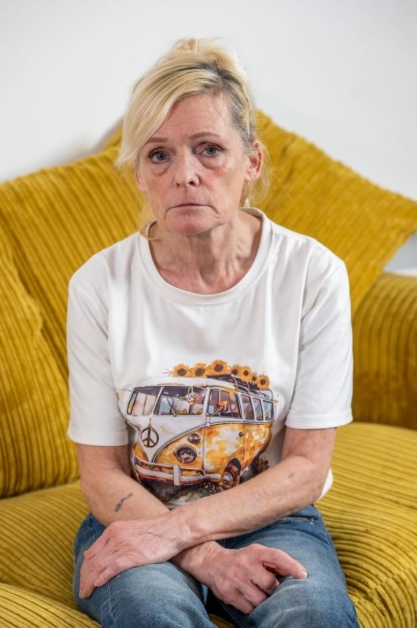 Jacqueline Dube sits on a yellow sofa in a portrait taken after the breakdown of her relationship with a 26-year-old Egyptian pastry chef she met on TikTok, a long-distance romance that led the Hertfordshire grandmother to travel to Egypt before ultimately ending their brief engagement after she realised the emotional and financial strain the relationship had placed on her life. | Source: Facebook/Daily Express