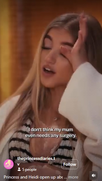 A different moment in the same conversation, and Andre's body language tells its own story — her hand raised to her eyes, which are briefly closed, as she speaks with conviction. The striped detailing of her top is visible, and the soft warm tones of the room behind her give the clip an unguarded, almost confessional feel. | Source: Instagram/theprincessdiaries.tv