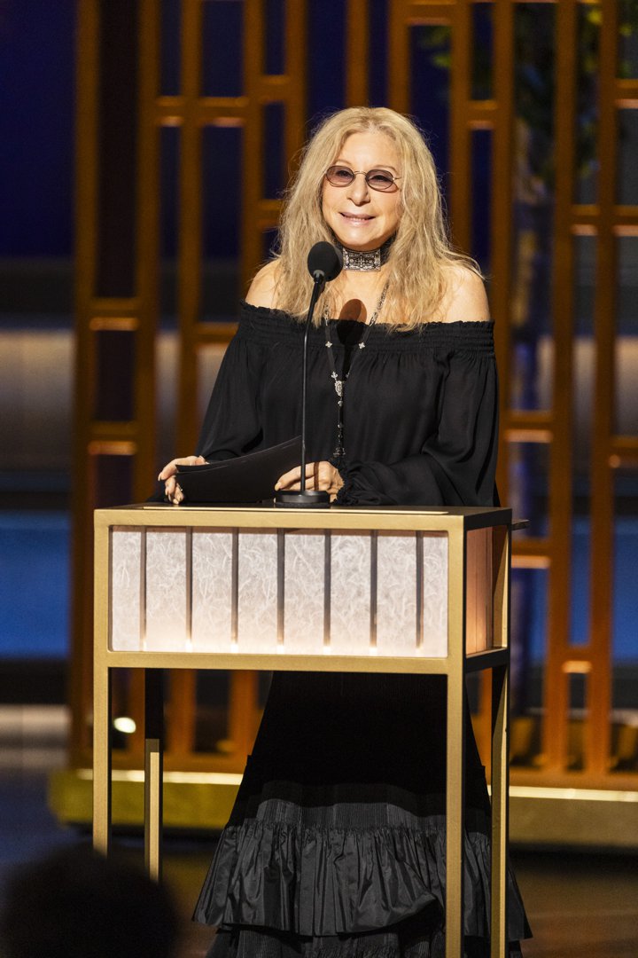 Barbra Streisand addresses the audience from the podium on March 15, 2026 | Source: Getty Images
