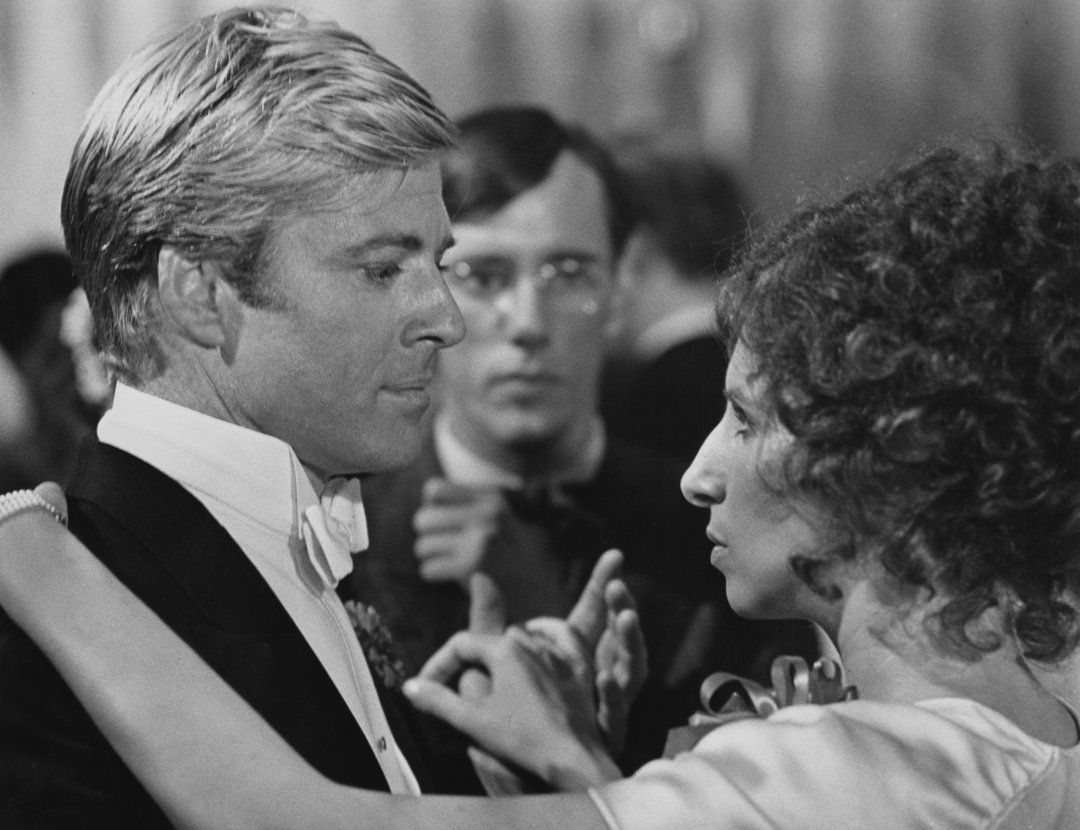 Robert Redford and Barbra Streisand during a scene from the classic movie in 1973. | Source: Getty Images