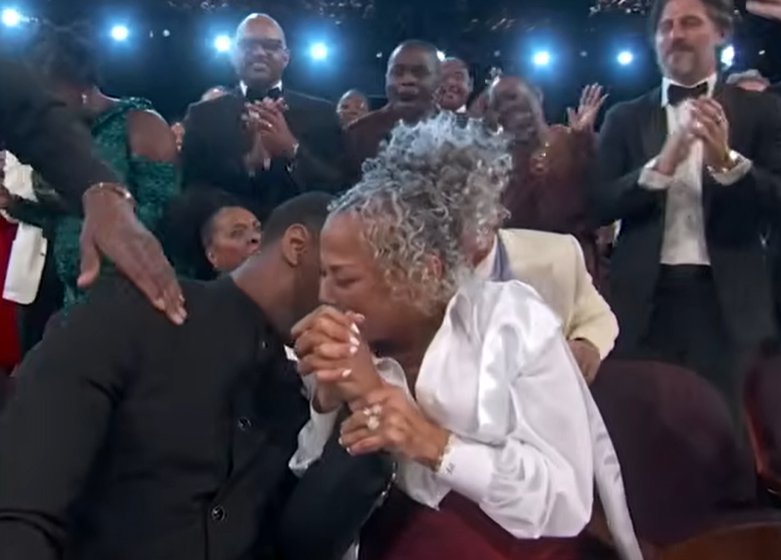 Donna Jordan Donna Jordan bows her head near her son&rsquo;s shoulder, her hands clasped around his as she becomes visibly emotional during the standing ovation. | Source: YouTube/ABCNews