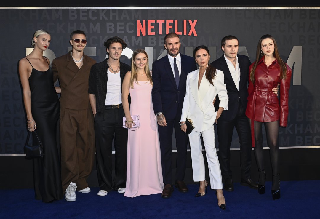 (L-R) Mia Regan, Romeo, Cruz, Harper, David, Victoria, Brooklyn and Nicola Peltz Beckham attend the Netflix 'Beckham' UK Premiere at The Curzon Mayfair on 3 October 2023 in London, England. | Source: Getty Images